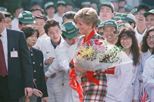 HRH Princess Diana, The Princess of Wales with workers at the Honda factory in Tokyo