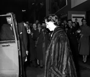 00102 Prints: HRH Princess Margaret shows off her new hairstyle as she enters her car after leaving