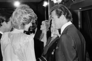 01054 Prints: HRH The Princess of Wales, Princess Diana talking with lead actor Roger Moore