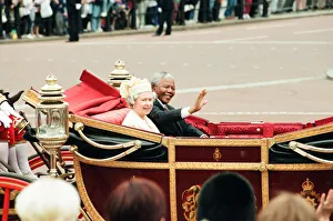 HRH Queen Elizabeth II with South African President Nelson Mandela seen here in the state