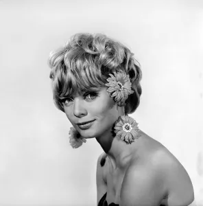 00061 Prints: hristmas Earrings: Uschi Bernell modelling Christmas design earrings. 1965 D178-002