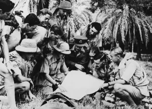 Myanmar Prints: A Hudson crew operating over Burma. In a jungle clearing an RAF engineer briefs a