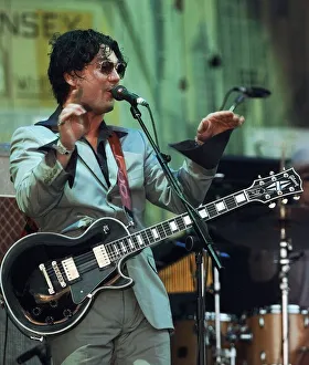 Huey from the Fun Lovin Criminals June 1999 performing on stage at the Glastonbury