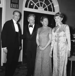 Journalism Prints: Hugh Cudlipp, Chairman, Daily Mirror Newspapers and wife Jodi Hyland greet Anthony