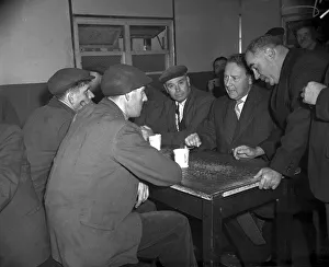 00029 Prints: Hugh Gaitskell, MP, 1958 talks with Liverpool dockers over a mug of tea in Gladstone Dock