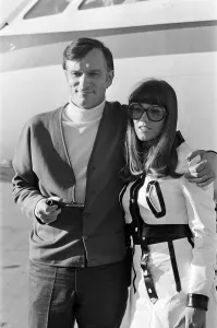 01065 Prints: Hugh Hefner arriving at Gatwick Airport with his girlfriend Barbara Benton