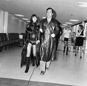Long Prints: Hugh Hefner and his girlfriend Barbi Benton at Londons Heathrow airport