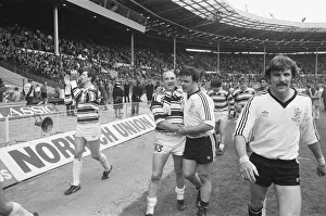 Hull and Widnes players complete a lap of honour at the end of the Rugby League Cup Final