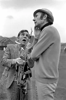 Images Dated 16th January 1975: Humour: comedy. Norman Wisdom and Tony Fayne at Golf Course at Penynhell