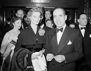 00161 Prints: Humphrey Bogart with his wife Lauren Bacall at a film premiere film premier
