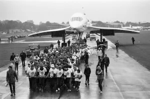 Concorde Prints: Hundreds of people were drenched by heavy rain as they pulled Concorde around an airfield