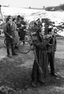 Binoculars Prints: Hungarian Revolt 1956. Freedom fighters gather on the Austrian border following