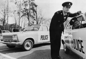 Two Huntingdon police car drivers PC Edward Godfrey and PC Alan Coles pose with their new
