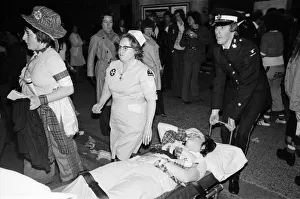 01013 Prints: Hysterical Bay City Rollers fans outside the Odeon Hammersmith after the groups concert