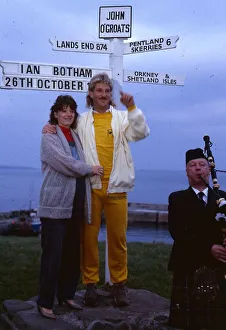 Bagpipes Prints: Ian Botham cricketer October 1985 With wife at John O Groats sign post piper