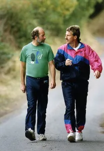 Portrai Prints: Ian Botham ex Cricket player on charity walk talking with Daily Mirror sports writer