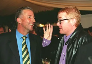 00188 Prints: Ian Botham (left) October 1999 talking with Chris Evans at the Dunhill golf pro-am party