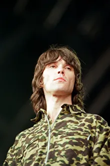00947 Prints: Ian Brown performing, he is the support act at a Catatonia concert at Margam Park
