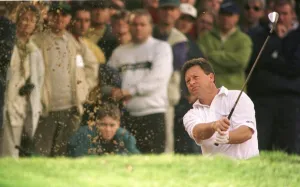Ian Woosnam golfer October 1998 plays out of a bunker on the 15th green