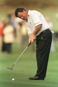 Putter Prints: Ian Woosnam golfer October 1998 putts on the 12th green at Wentworth golf course