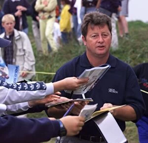 Images Dated 13th July 1999: Ian Woosnam signs autographs during his practice round at the 128th Golf open at