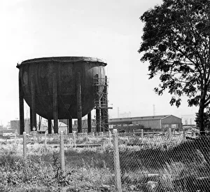 Trees Prints: ICI, Wilton. The bottom half of a 5000 ton chemical storage tank being fitted into place