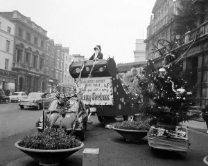 Christmas Tree Prints: This illuminated sleigh towed'by a Volkswagon Beetle car with a reindeer