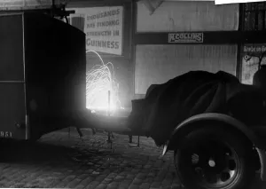 Incendiary bomb detonates close to a fire engine in the City of London. October 1940