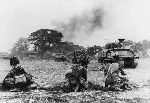 01455 Prints: Indian tanks and infantry attack a village in Burma during Second World War
