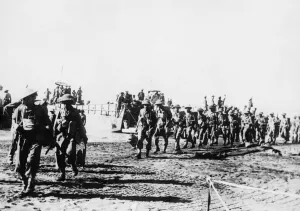 01456 Prints: Indian troops disembarking from their landing craft after commandos had secured the beach