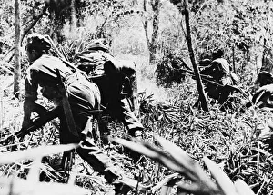 Indian troops of the Frontier Force Rifles launch an assault on a precipitous hill
