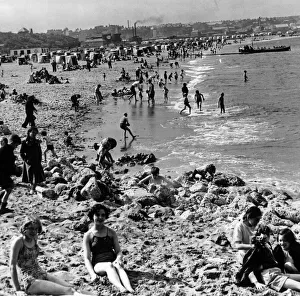 Holidaymakers Prints: With industry in the background, South Shields beach provides a glorious playground for