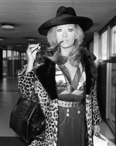 Ingrid Pitt arriving at Heathrow airport from Rome where she has had talks about her new
