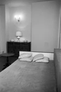 Interior view of a flat, showing the living room area and sofa bed. 29th October 1986