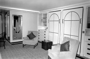 Interior view showing one of the cabin living rooms aboard the luxury passenger liner QE2