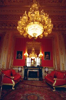 Interior view of Windsor Castle showing the Crimson Drawing Room restored after it was