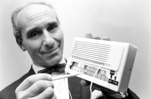 00077 Prints: Inventor Bert Coleman shows how to play a note on his electronic mini organ