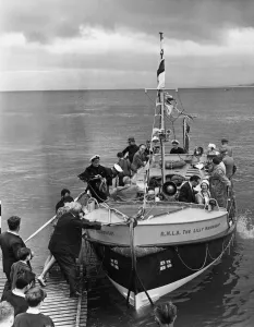 Craft Prints: Invited guests being brought being given a trip around the bay on the Llandudno lifeboat