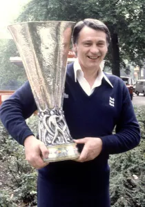 Holland Prints: Ipswich Town manager Bobby Robson holds aloft the UEFA Cup trophy after his side defeated