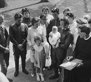 Isle of Man TT Races. 50cc rider Brian Gleed has his daughter christened on the island