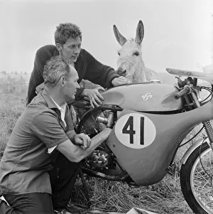Isle of Man TT Races. Bill Hawthorne and his mechanic Pat Lynch tuning up his BSA
