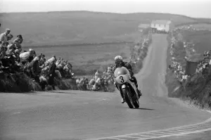 Isle of Man TT Races -Junior 350cc Event. Winner Mike Hailwood on his Honda