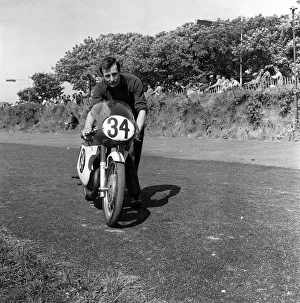 Rider Prints: Isle of Man TT (Tourist Trophy) June 1962 Mike Hawthorne pushing motorbike
