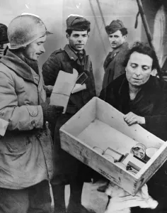 Italian civilians get food from Allies. Italian civilians in the Nettuno beachhead area