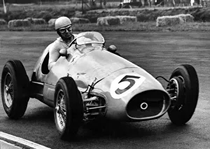 Italian racing driver Alberto Ascari in action in his Ferrari 500 during the 1953 British