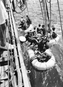 Italian sailors waiting to board a British Ship after their ship was sunk in