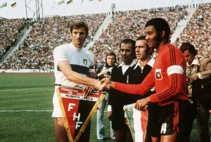 Kick Off Prints: Italy V Haiti World Cup 1974 Facchetti (Italy) and Nazaire (Haiti) shake hands