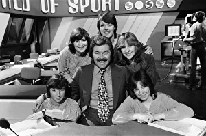 ITVs World of Sport presenter Dickie Davies with five women who work with