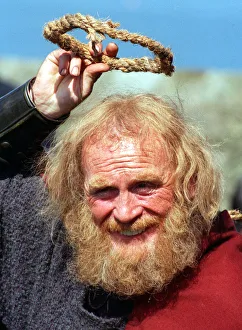 Ivanhoe Photo call at Blackness Castle James Cosmo who plays Cedric of Rotherwood holding