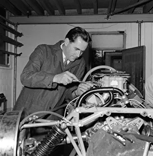 Jack Brabham working on his Grand Prix racing cars engine 20 / 7 / 62 Q6068-12